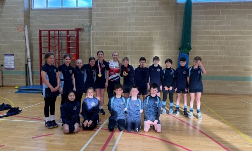 Paralympian Laura Sugar with pupils from Dame Bradbury's